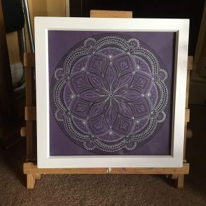 Mauve framed Mandala in acrylics on canvas by Carolyn Freeman