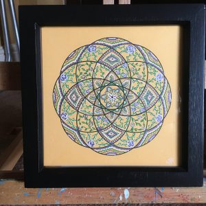 Blue, yellow and green Mandala - 7" x 7" in small black box frame by Carolyn Freeman