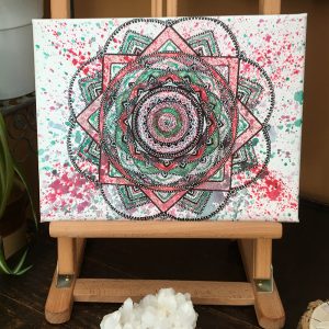 Red, green and black Mandala in acrylic pen on canvas - 12" x 9" by Carolyn Freeman