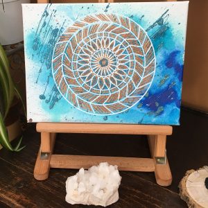 Brown on blue Mandala in acrylic pen on canvas - 12" x 9" by Carolyn Freeman