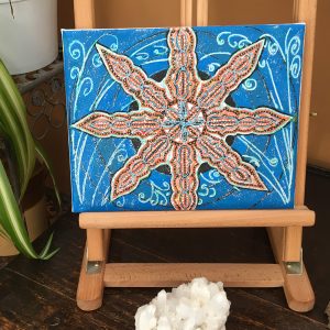 Brown on blue Mandala in acrylic pen on canvas - 12" x 8" by Carolyn Freeman